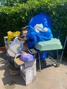 Doos met los afval en Kleine losse items 0,5m3 ophalen in Oegstgeest